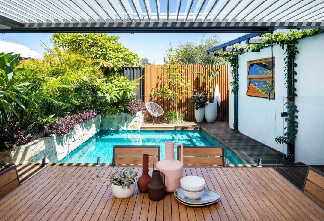 colourful outdoor garden space with pavilion and pool